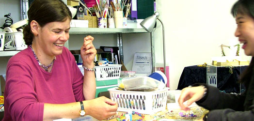 Lynn Davy Beading - Lynn demonstrating beading techniques at the Beading Open Day, Tilseds Gallery, High Street, Wimborne, Dorset on Saturday 23 June 2007.www.tilseds.co.uk. Photography by Joanna Bury
