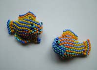 Lynn Davy Beading. Reef Fish.  Peyote stitched tropical fish from a design by Vivien Caldwell. Each of these tiny beauties takes over an hour to make, even with a pattern to follow.