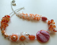 Lynn Davy Beading - Beading Gallery - Photography by Joanna Bury. Fire Daisy Choker  A Fire Agate focal complemented with beaded flowers, freshwater pearls and lots of carnelian chips. Currently listed for sale in my Etsy shop   click on thumbnail to see larger image